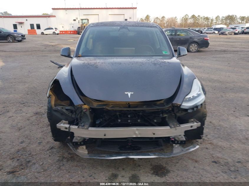 2023 Tesla Model Y Awd/Long Range Dual Motor All-Wheel Drive VIN: 7SAYGDEE5PA125274 Lot: 43916626