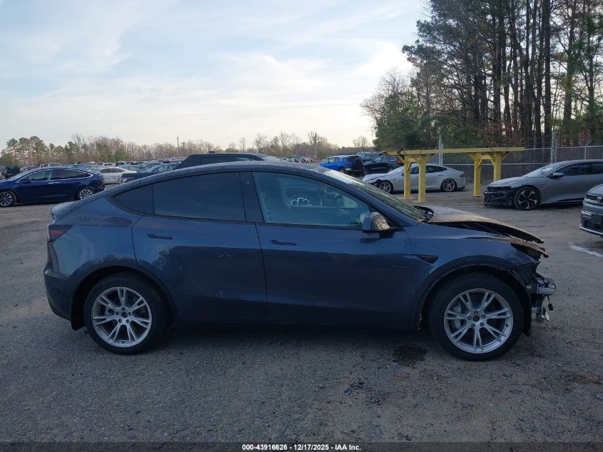 2023 Tesla Model Y Awd/Long Range Dual Motor All-Wheel Drive VIN: 7SAYGDEE5PA125274 Lot: 43916626