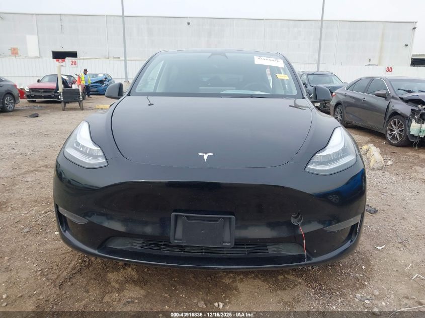 2023 Tesla Model Y Awd/Long Range Dual Motor All-Wheel Drive VIN: 7SAYGDEE6PA076988 Lot: 43916836