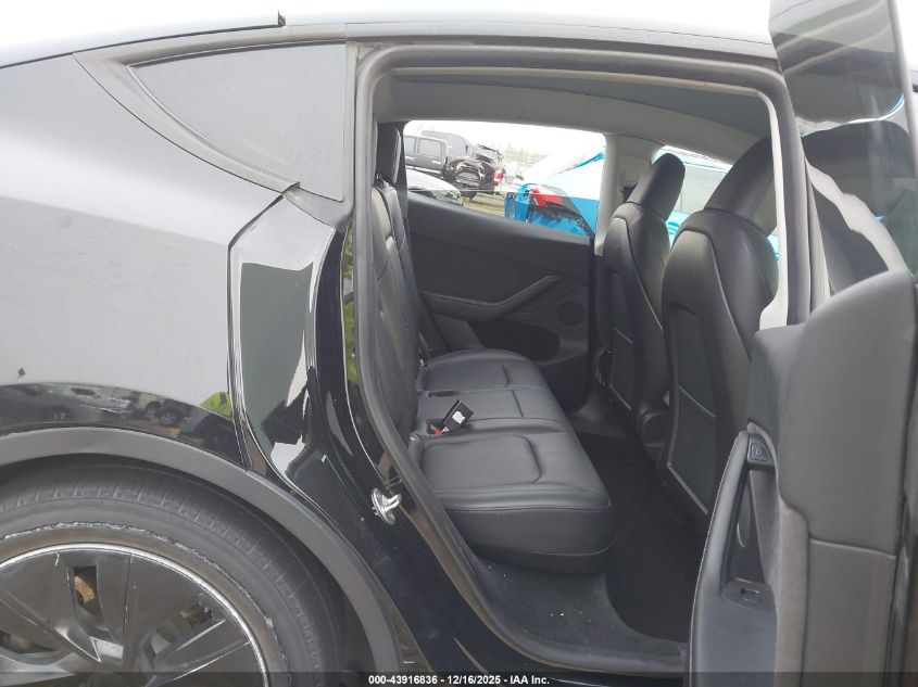 2023 Tesla Model Y Awd/Long Range Dual Motor All-Wheel Drive VIN: 7SAYGDEE6PA076988 Lot: 43916836