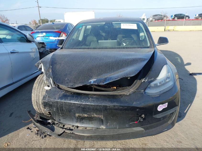 2018 Tesla Model 3 Long Range/Mid Range VIN: 5YJ3E1EA0JF165765 Lot: 43920667