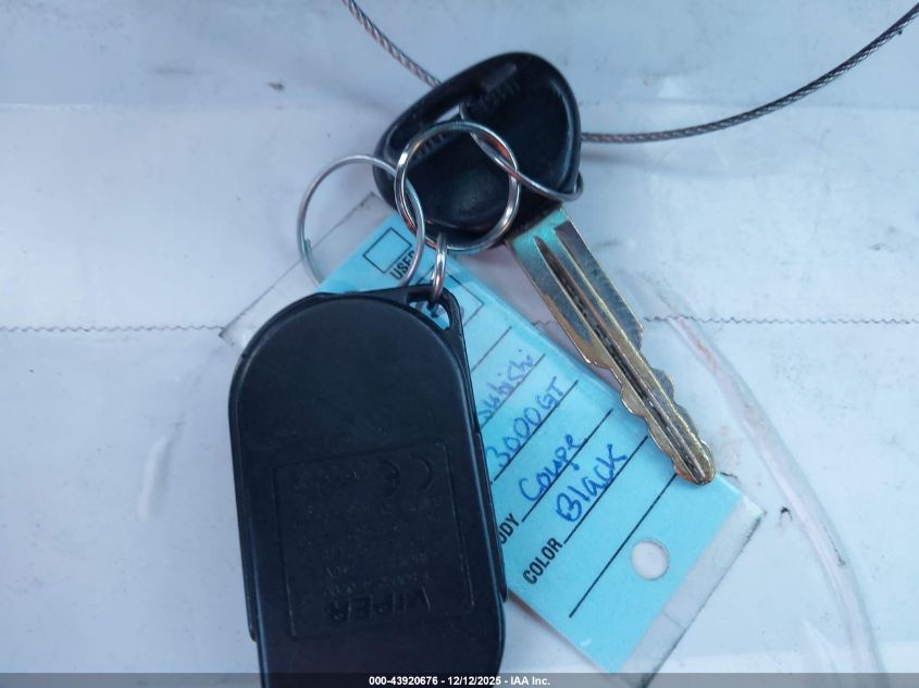 1999 Mitsubishi 3000 Gt VIN: JA3AM44H5XY003132 Lot: 43920676