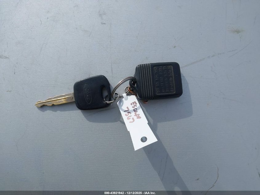 2004 Ford Escape Xls VIN: 1FMCU02124KB38345 Lot: 43921942