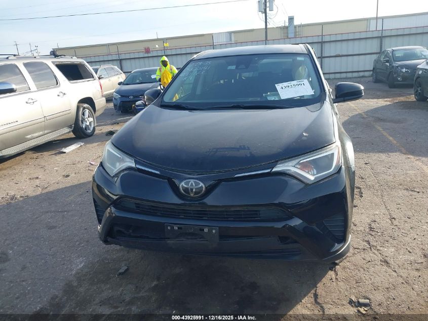 2018 Toyota Rav4 Le VIN: 2T3BFREV2JW707016 Lot: 43925991