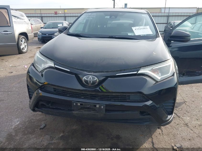 2018 Toyota Rav4 Le VIN: 2T3BFREV2JW707016 Lot: 43925991