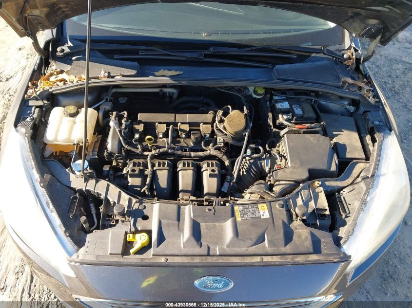 2015 Ford Focus Titanium VIN: 1FADP3N23FL218472 Lot: 43930566