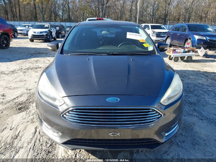 2015 Ford Focus Titanium VIN: 1FADP3N23FL218472 Lot: 43930566