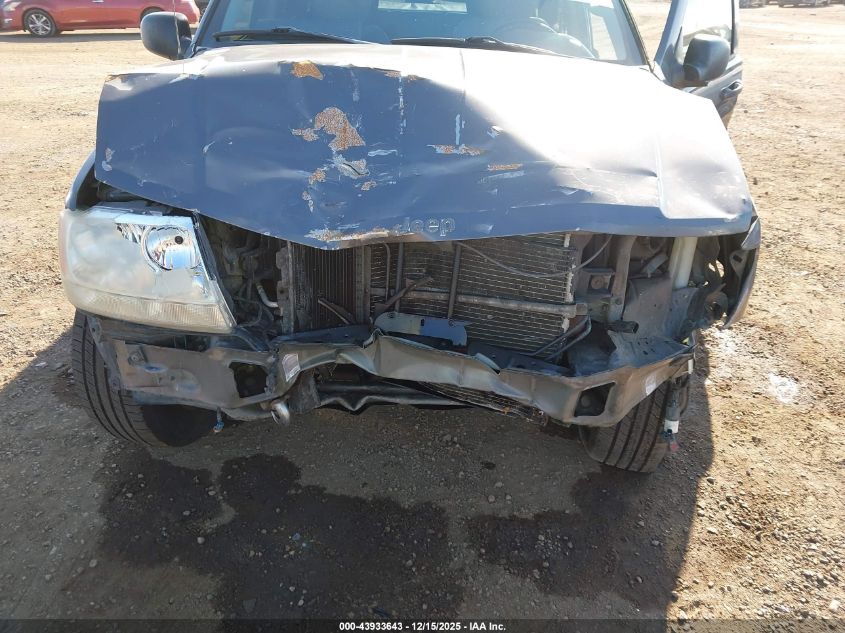 2002 Jeep Grand Cherokee Overland VIN: 1J8GW68J52C104071 Lot: 43933643