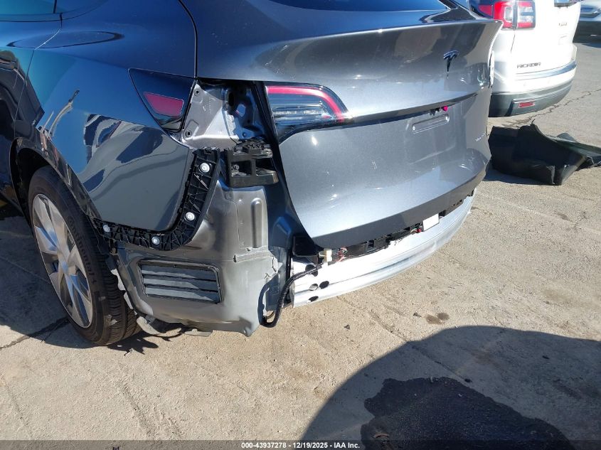 2023 Tesla Model Y Awd/Long Range Dual Motor All-Wheel Drive VIN: 7SAYGAEE3PF942325 Lot: 43937278