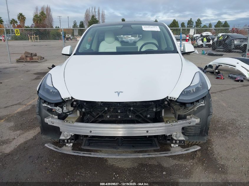 2023 Tesla Model Y Awd/Long Range Dual Motor All-Wheel Drive VIN: 7SAYGDEE5PF633005 Lot: 43939527