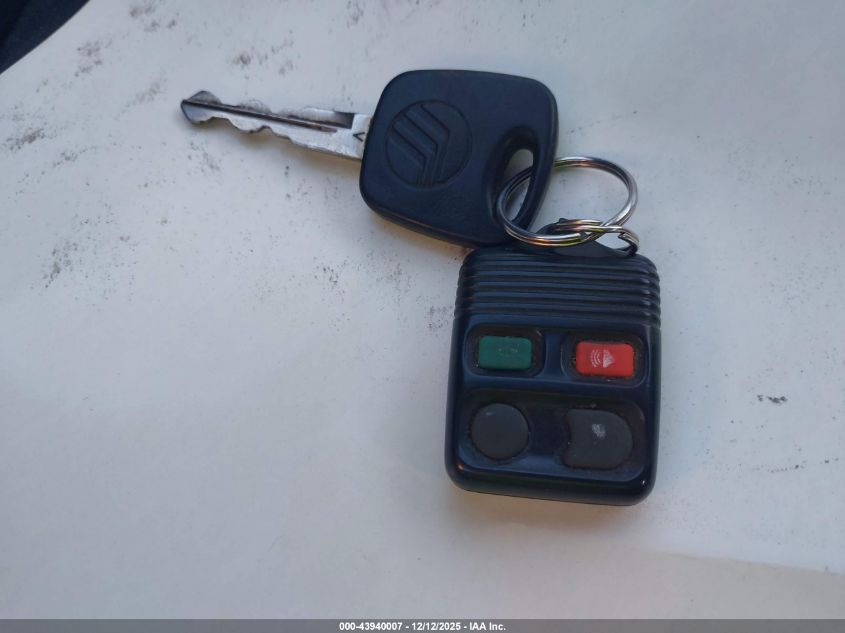 2002 Mercury Cougar V6 VIN: 1ZWFT61LX25605638 Lot: 43940007