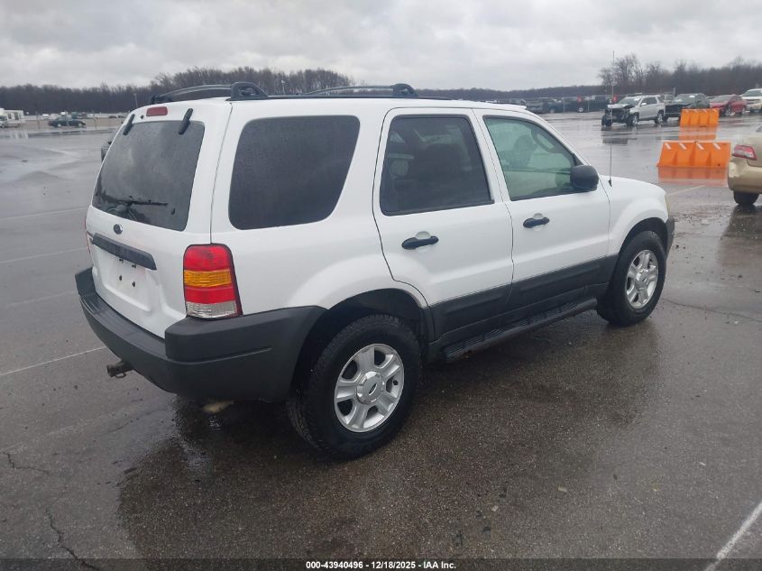1FMYU93134KA81551 2004 FORD ESCAPE photo no. 4