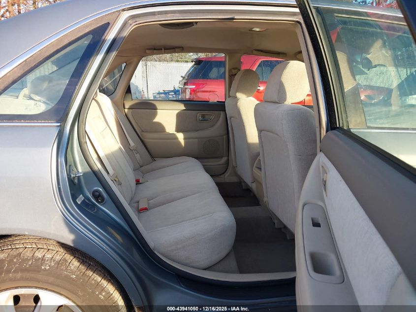 2002 Toyota Avalon Xl VIN: 4T1BF28B82U202603 Lot: 43941050