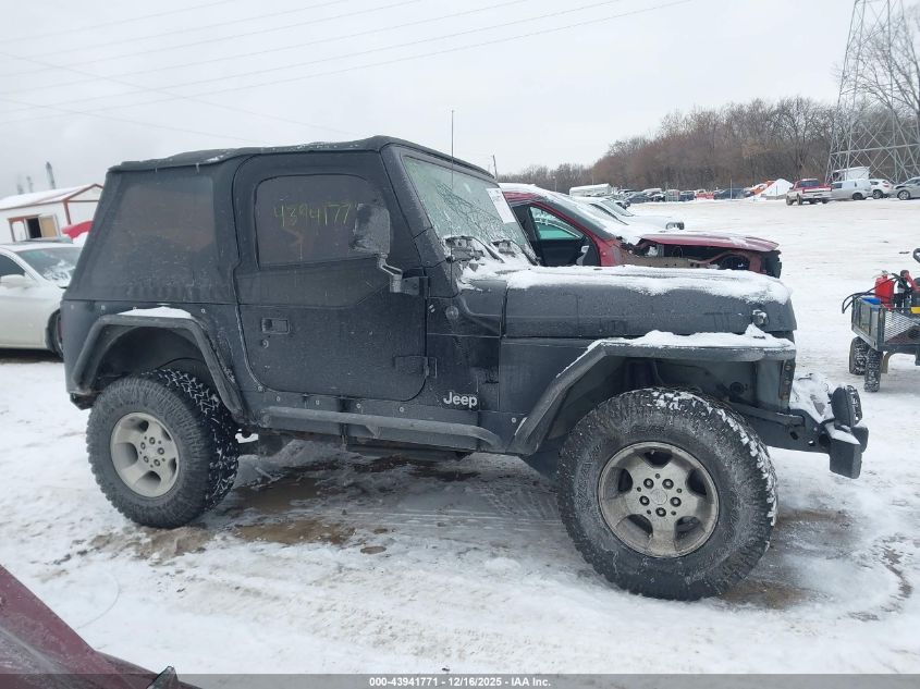 2002 Jeep Wrangler Sport VIN: 1J4FA49S02P704819 Lot: 43941771