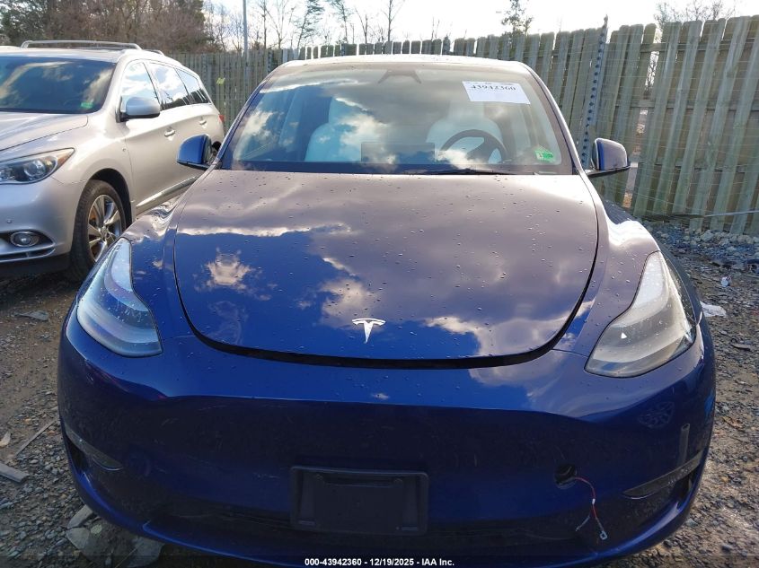 2023 Tesla Model Y Awd/Long Range Dual Motor All-Wheel Drive VIN: 7SAYGDEE8PA206351 Lot: 43942360