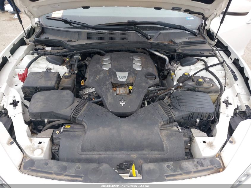 2014 Maserati Ghibli VIN: ZAM57XSA0E1091574 Lot: 43942991