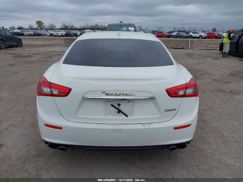 2014 Maserati Ghibli VIN: ZAM57XSA0E1091574 Lot: 43942991