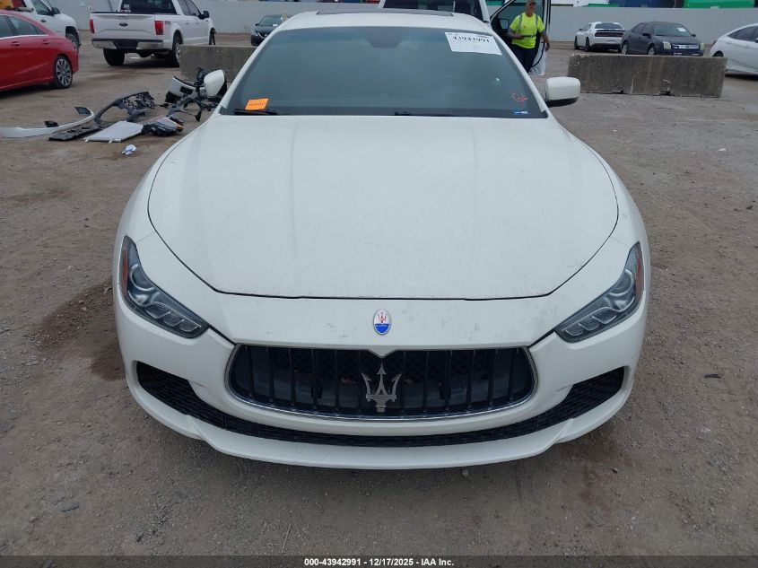 2014 Maserati Ghibli VIN: ZAM57XSA0E1091574 Lot: 43942991