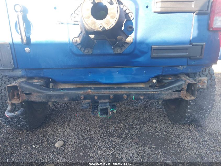 2009 Jeep Wrangler Unlimited Sahara VIN: 1J4GA59149L776609 Lot: 43943516