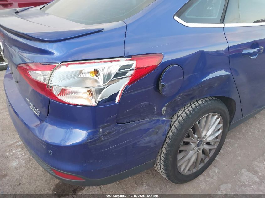 2014 Ford Focus Titanium VIN: 1FADP3J21EL241401 Lot: 43943550