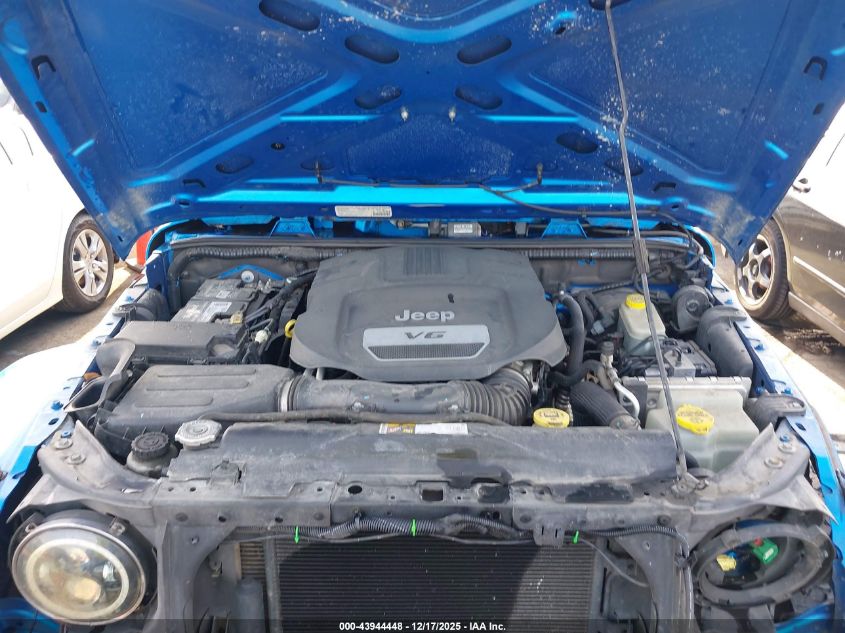 2014 Jeep Wrangler Unlimited Freedom Edition VIN: 1C4BJWDG8EL235736 Lot: 43944448