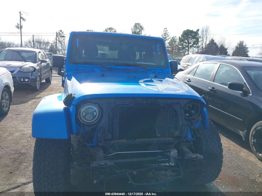2014 Jeep Wrangler Unlimited Freedom Edition VIN: 1C4BJWDG8EL235736 Lot: 43944448