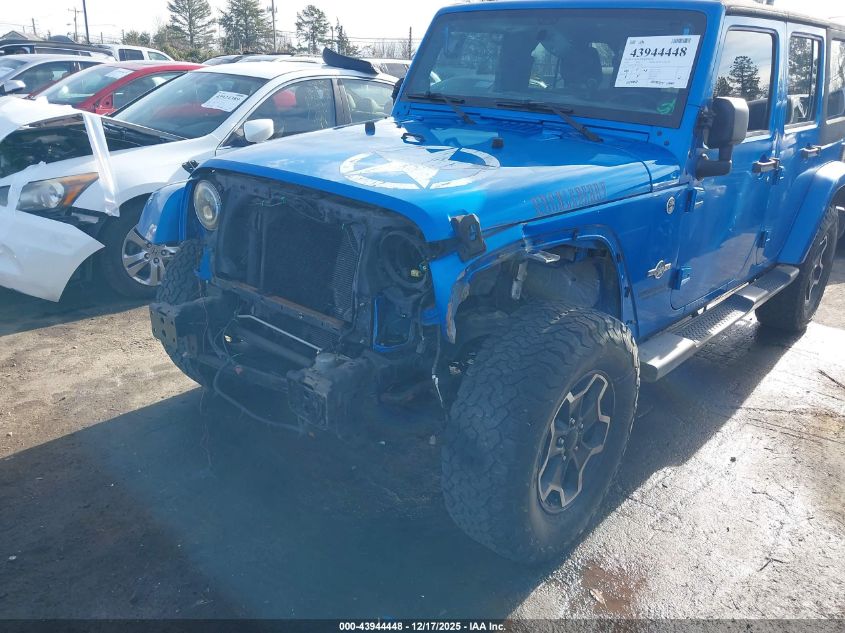 2014 Jeep Wrangler Unlimited Freedom Edition VIN: 1C4BJWDG8EL235736 Lot: 43944448