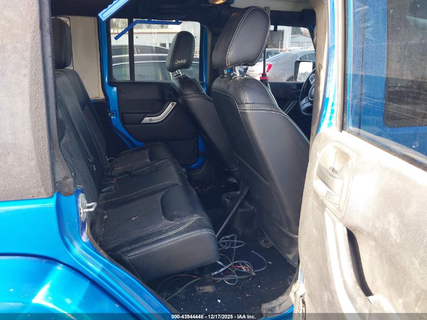 2014 Jeep Wrangler Unlimited Freedom Edition VIN: 1C4BJWDG8EL235736 Lot: 43944448