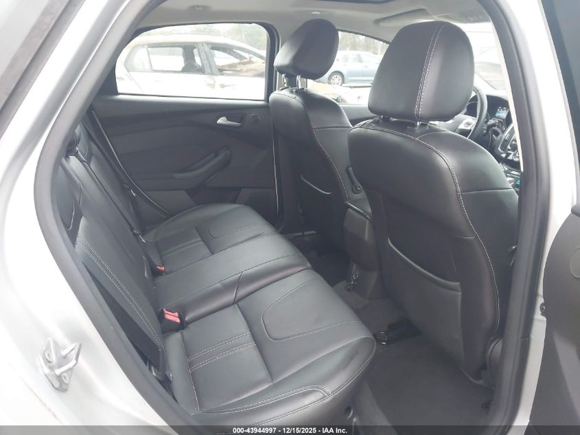 2014 Ford Focus Titanium VIN: 1FADP3N24EL269770 Lot: 43944997