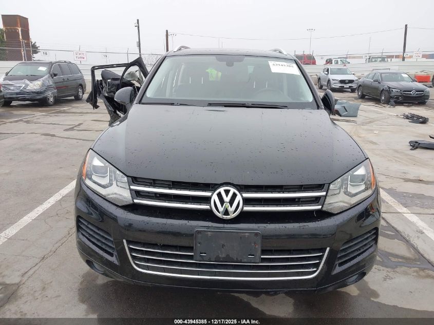 2014 Volkswagen Touareg Tdi Sport VIN: WVGEP9BP1ED000858 Lot: 43945385