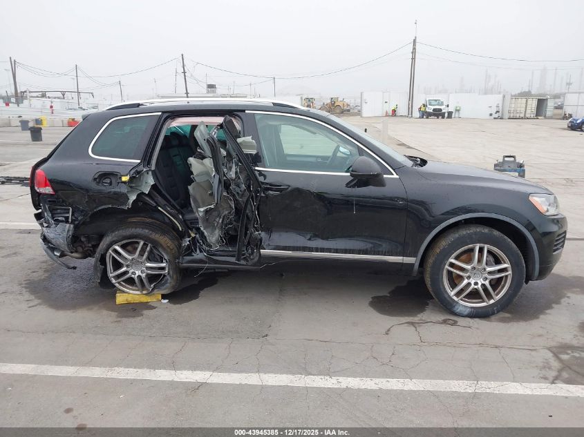 2014 Volkswagen Touareg Tdi Sport VIN: WVGEP9BP1ED000858 Lot: 43945385