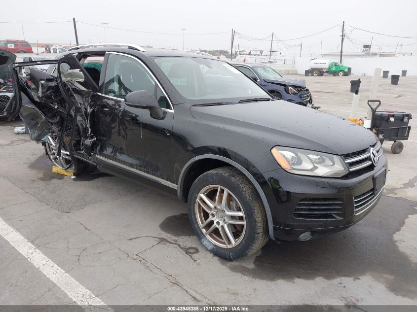 2014 Volkswagen Touareg Tdi Sport VIN: WVGEP9BP1ED000858 Lot: 43945385