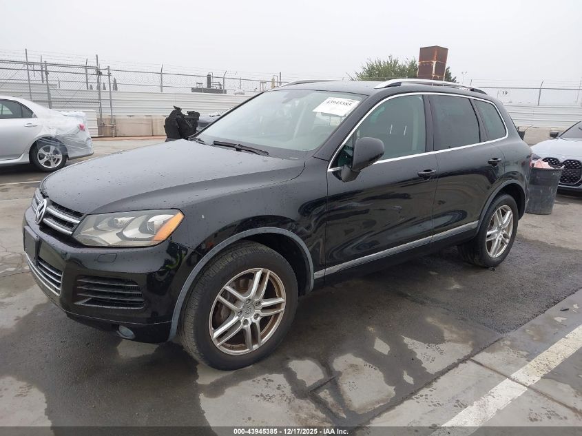 2014 Volkswagen Touareg Tdi Sport VIN: WVGEP9BP1ED000858 Lot: 43945385