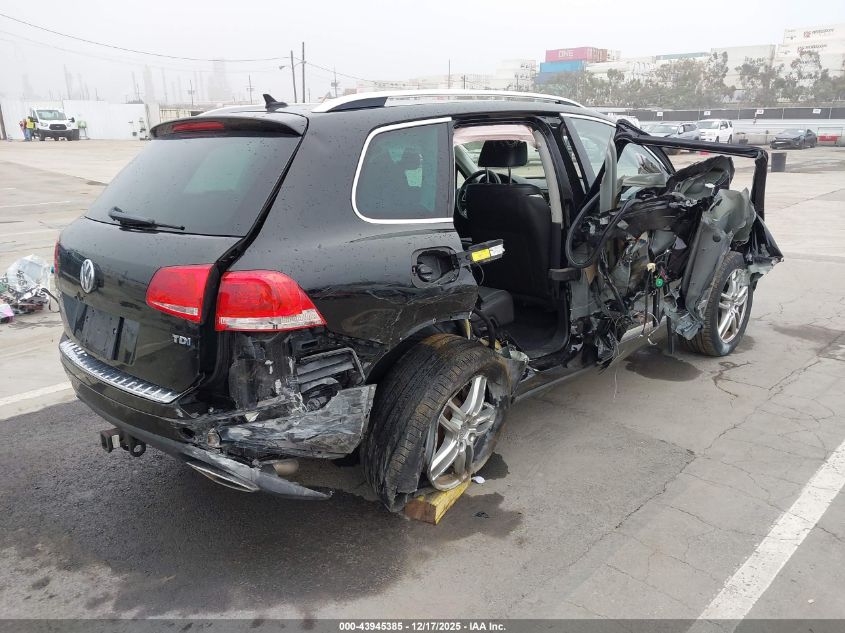 2014 Volkswagen Touareg Tdi Sport VIN: WVGEP9BP1ED000858 Lot: 43945385