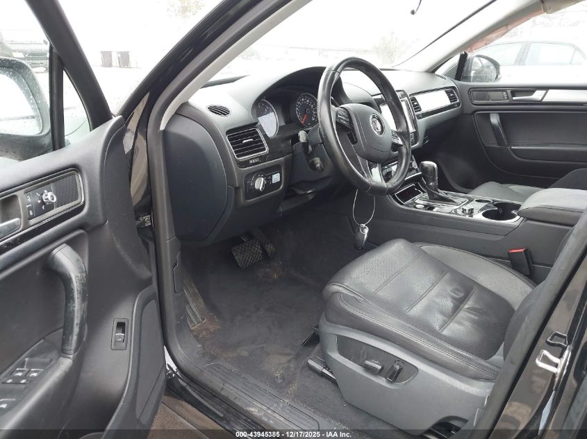 2014 Volkswagen Touareg Tdi Sport VIN: WVGEP9BP1ED000858 Lot: 43945385