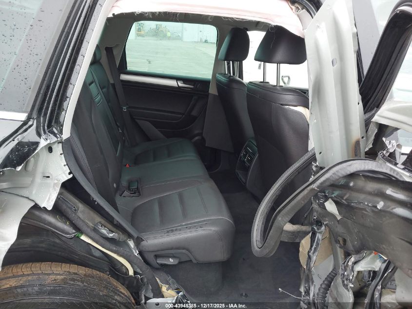 2014 Volkswagen Touareg Tdi Sport VIN: WVGEP9BP1ED000858 Lot: 43945385