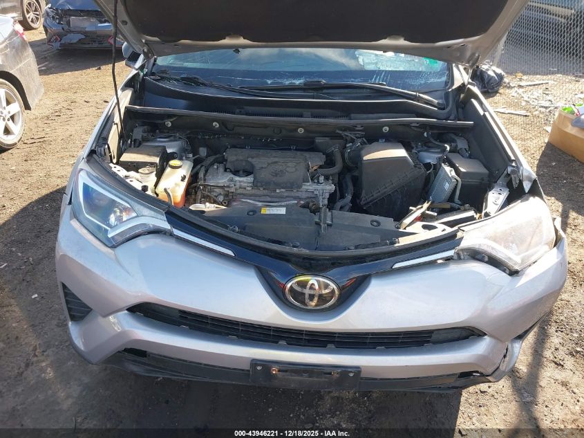 2018 Toyota Rav4 Le VIN: 2T3BFREVXJW717874 Lot: 43946221