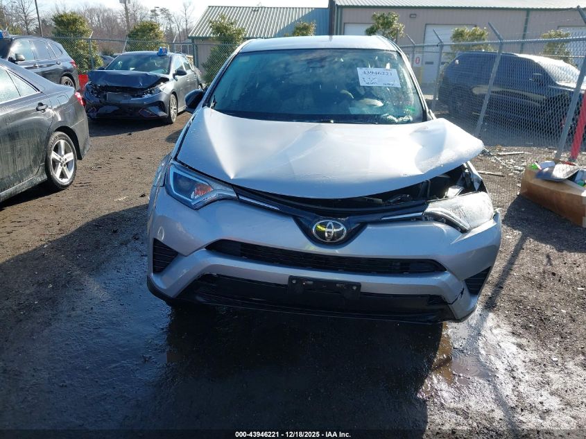 2018 Toyota Rav4 Le VIN: 2T3BFREVXJW717874 Lot: 43946221