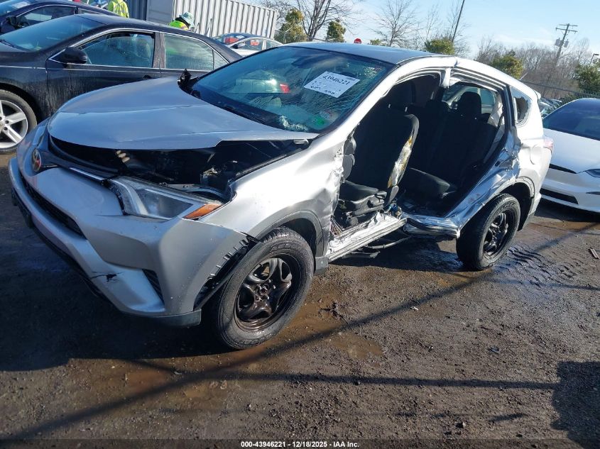 2018 Toyota Rav4 Le VIN: 2T3BFREVXJW717874 Lot: 43946221