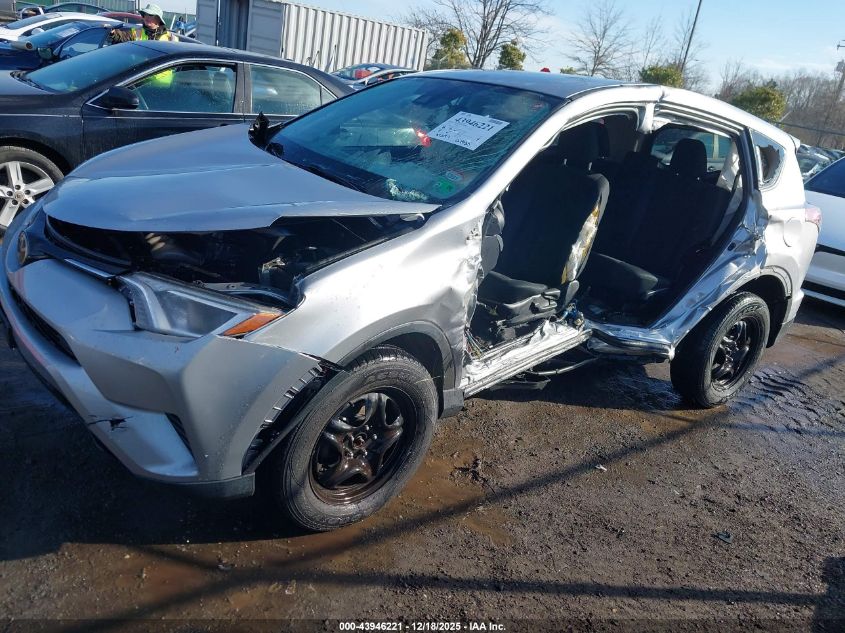 2018 Toyota Rav4 Le VIN: 2T3BFREVXJW717874 Lot: 43946221