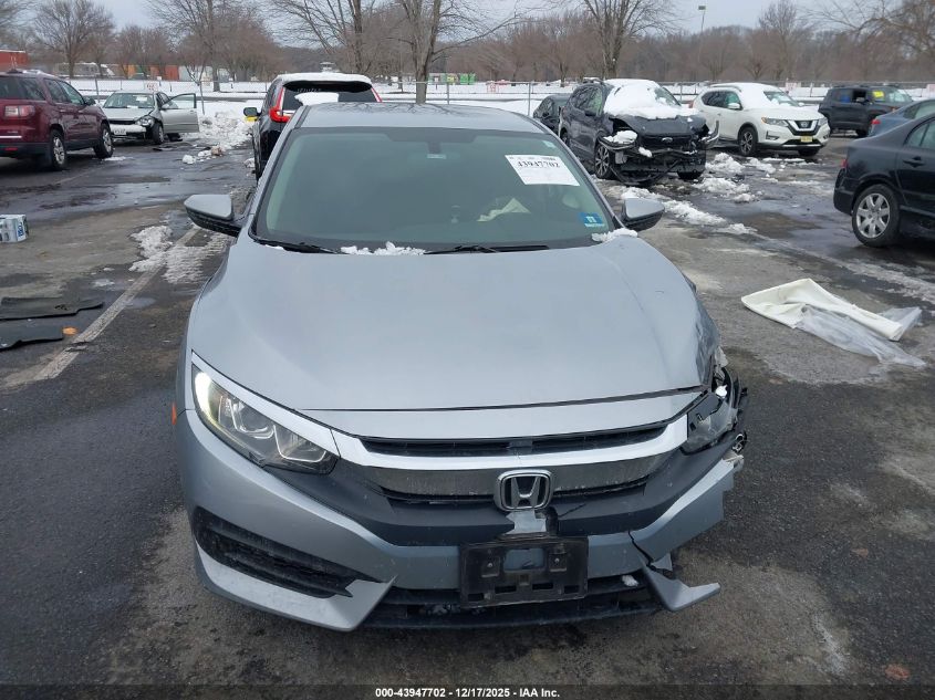 2018 Honda Civic Lx VIN: 19XFC2E59JE009256 Lot: 43947702