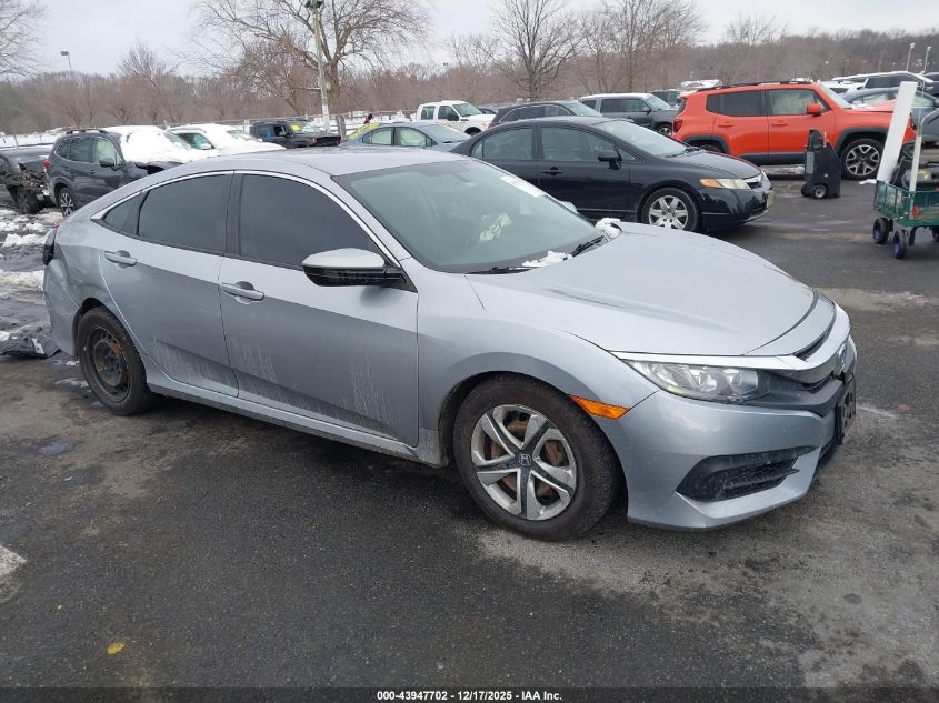 2018 Honda Civic Lx VIN: 19XFC2E59JE009256 Lot: 43947702