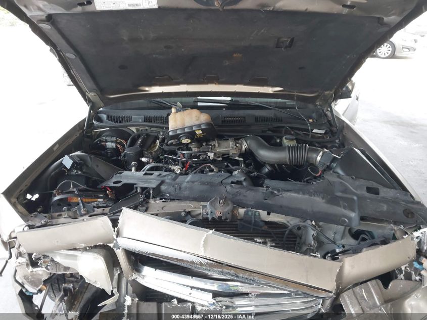 2002 Ford Crown Victoria Lx VIN: 2FAFP74W72X140747 Lot: 43948657