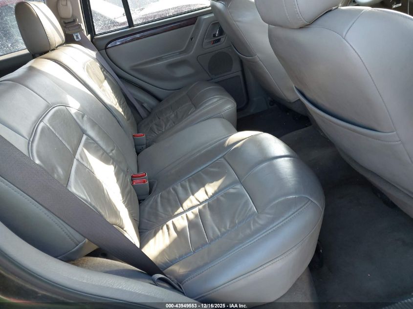 2002 Jeep Grand Cherokee Limited VIN: 1J8GW58N62C304566 Lot: 43949553