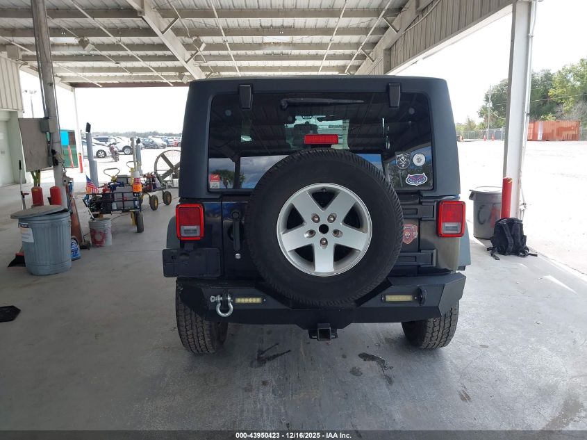 2011 Jeep Wrangler Sport VIN: 1J4AA2D17BL596073 Lot: 43950423