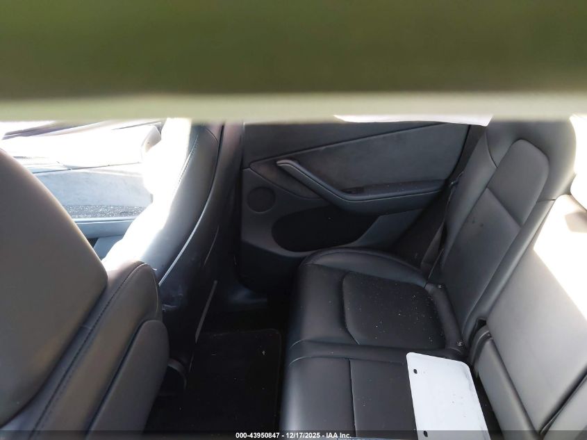 2023 Tesla Model Y Awd/Long Range Dual Motor All-Wheel Drive VIN: 7SAYGDEE5PA210695 Lot: 43950847