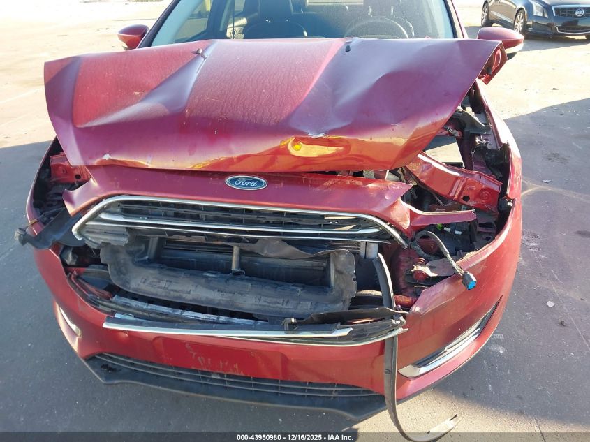 2016 Ford Focus Titanium VIN: 1FADP3J23GL342815 Lot: 43950980