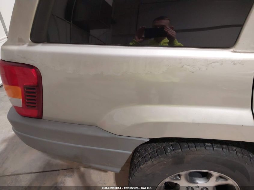 2004 Jeep Grand Cherokee Laredo VIN: 1J4GX48S34C326591 Lot: 43952014