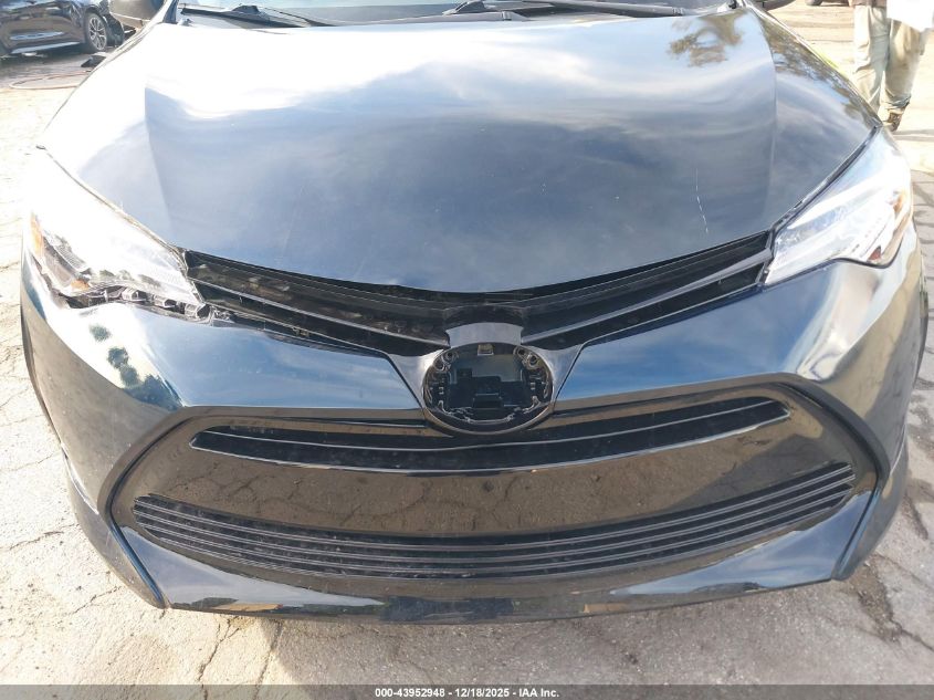 2017 Toyota Corolla Le VIN: 5YFBURHE3HP733601 Lot: 43952948