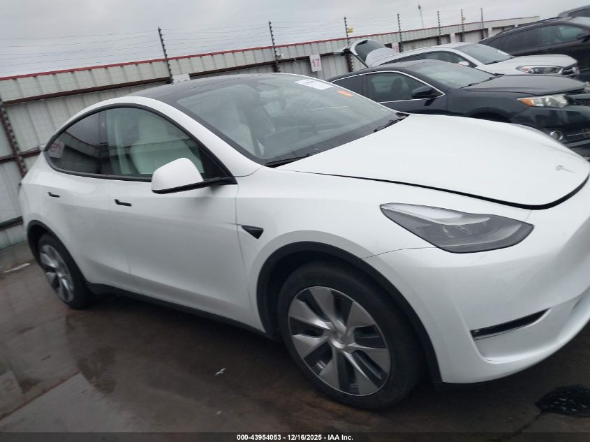 2023 Tesla Model Y Awd/Long Range Dual Motor All-Wheel Drive VIN: 7SAYGDEE5PF708429 Lot: 43954053